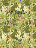 Whimsical greeting card front with cheetahs in party hats amidst lush green jungle leaves, text 'Happy Birthday'.