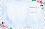 Interior of a watercolor greeting card, showing a blank light blue space for a handwritten message, adorned with watercolor flowers in the corners and the printed text 'Hope your day is sweet and special... just like you!'.