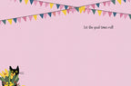 Inside of a light pink birthday card with colorful bunting. A black cat peeks from the bottom left. Text reads 'Let the good times roll!'. Blank space for a personalized message, perfect for children.