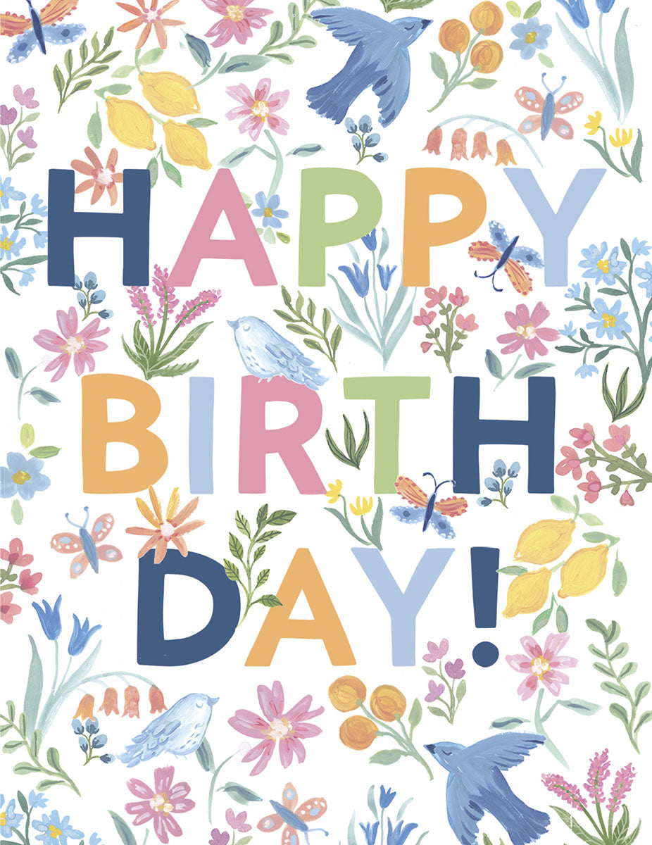Vibrant watercolor floral birthday greeting card for a child, featuring 'HAPPY BIRTHDAY!' text surrounded by colorful flowers, blue birds, yellow lemons, and butterflies on a white background.