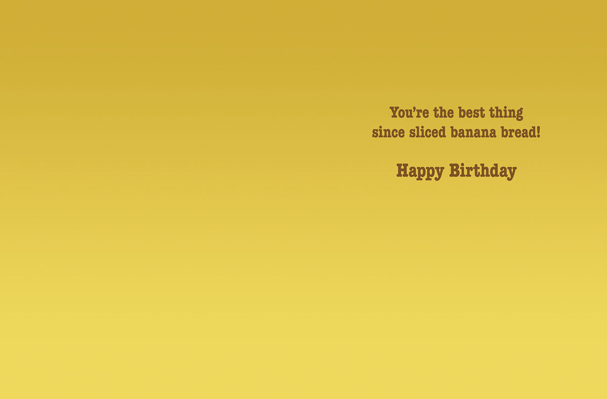 Inside of a funny banana-themed greeting card, displaying the heartfelt and humorous message 'You're the best thing since sliced banana bread! Happy Birthday' on a warm yellow background.