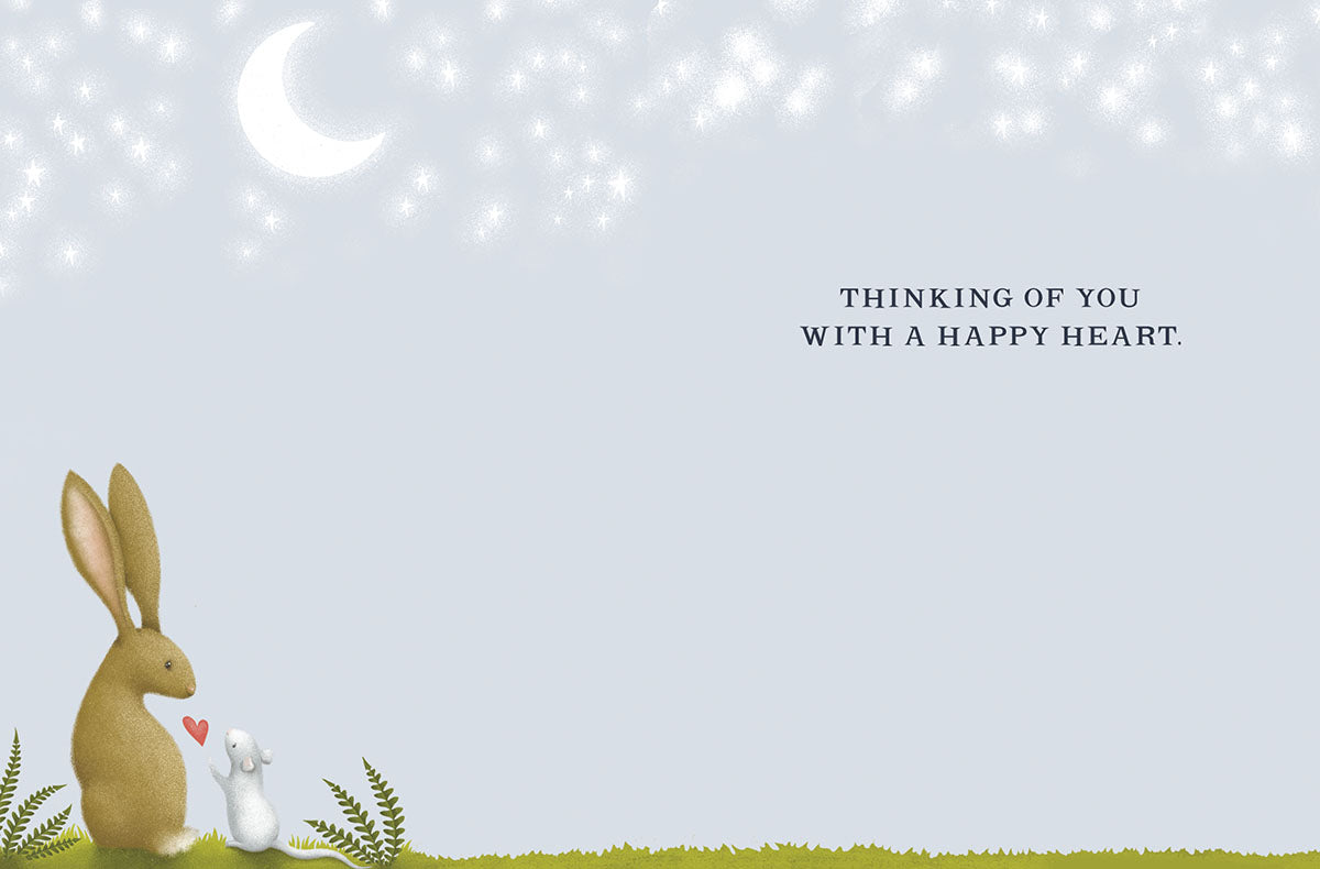 Inside of a cute friendship card featuring a rabbit and mouse illustration with the text 'Thinking of you with a happy heart', with ample blank space for a custom message.