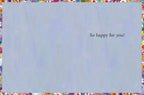 Inside view of a cheerful congratulations card with a light blue background and a colorful floral border, inscribed with 'So happy for you!'.