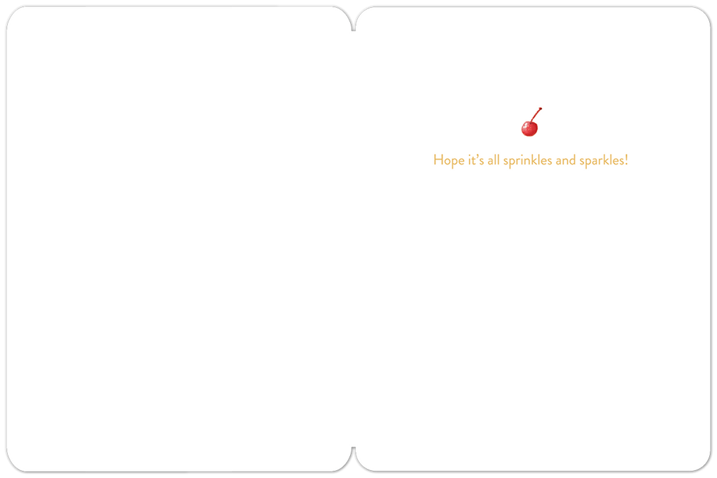 Inside of a modern greeting card with a gold message 'Hope it's all sprinkles and sparkles!' and a small red cherry illustration, offering space for a personalized message.