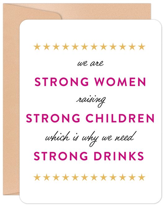 Front of a funny greeting card with gold stars and pink text: 'we are STRONG WOMEN raising STRONG CHILDREN which is why we need STRONG DRINKS'.