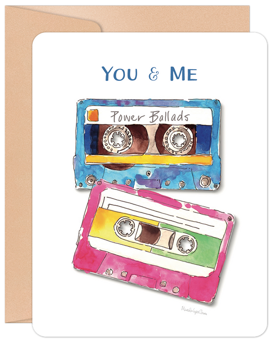 Front of a romantic anniversary card featuring two watercolor cassette tapes labeled 'Power Ballads' with 'YOU & ME' text.