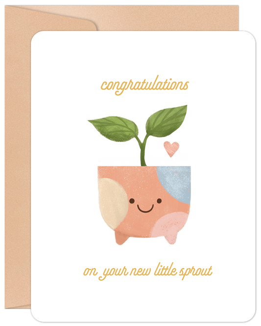 Front of a New Baby card featuring a cute smiling potted plant with green leaves and a pink heart, text says 'congratulations on your new little sprout'.