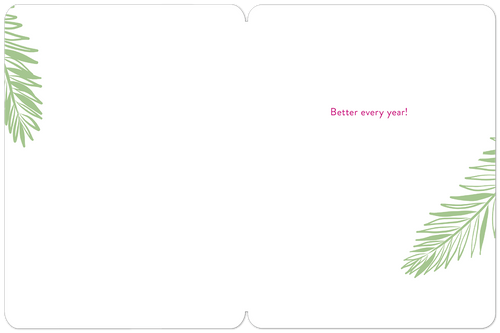 Inside of a floral greeting card with white space for a personalized message, decorated with green tropical leaves and 'Better every year!' in pink text.