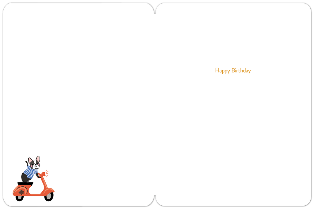 Inside of a minimalist white greeting card with 'Happy Birthday' written in orange script on the right side. A small French Bulldog on an orange scooter is in the bottom left corner, leaving ample space for a personal message.