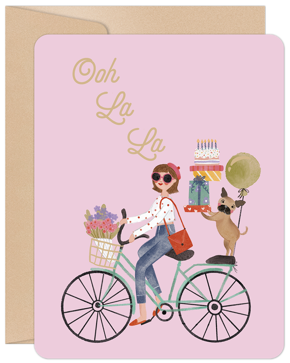 Stylish woman on a vintage bicycle with flowers, a pug, gifts, and 'Ooh La La' text on a pink lighthearted greeting card, ideal for Her.