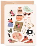 A beautifully illustrated greeting card featuring various self-care items such as a perfume bottle, coffee mug, heart-shaped sunglasses, cozy patterned socks, a journal, lipstick, ankle boots, a camera, a floral handbag, and a vase of flowers, accompanied by text bubbles 'You Time' and 'Fill Your Cup', all on a soft beige background with a brown envelope.