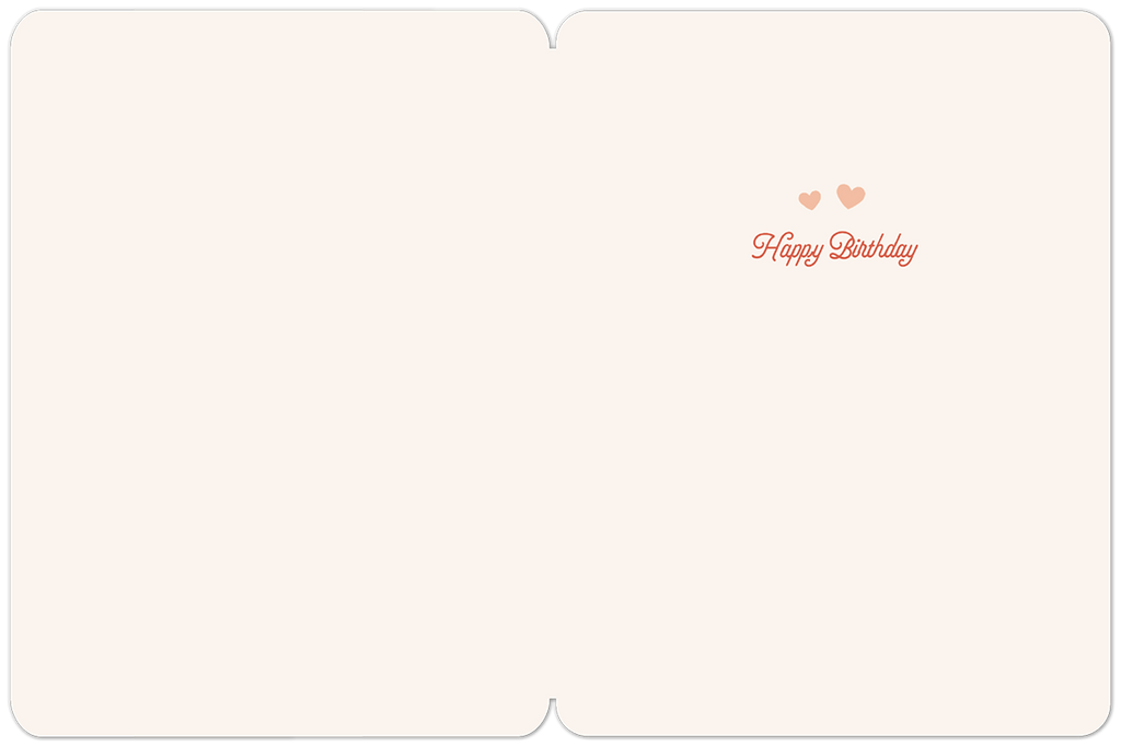 The inside of a minimalist greeting card, showing a plain off-white background with 'Happy Birthday' written in a delicate script with two small pink hearts in the top right corner, providing ample space for a personalized message.