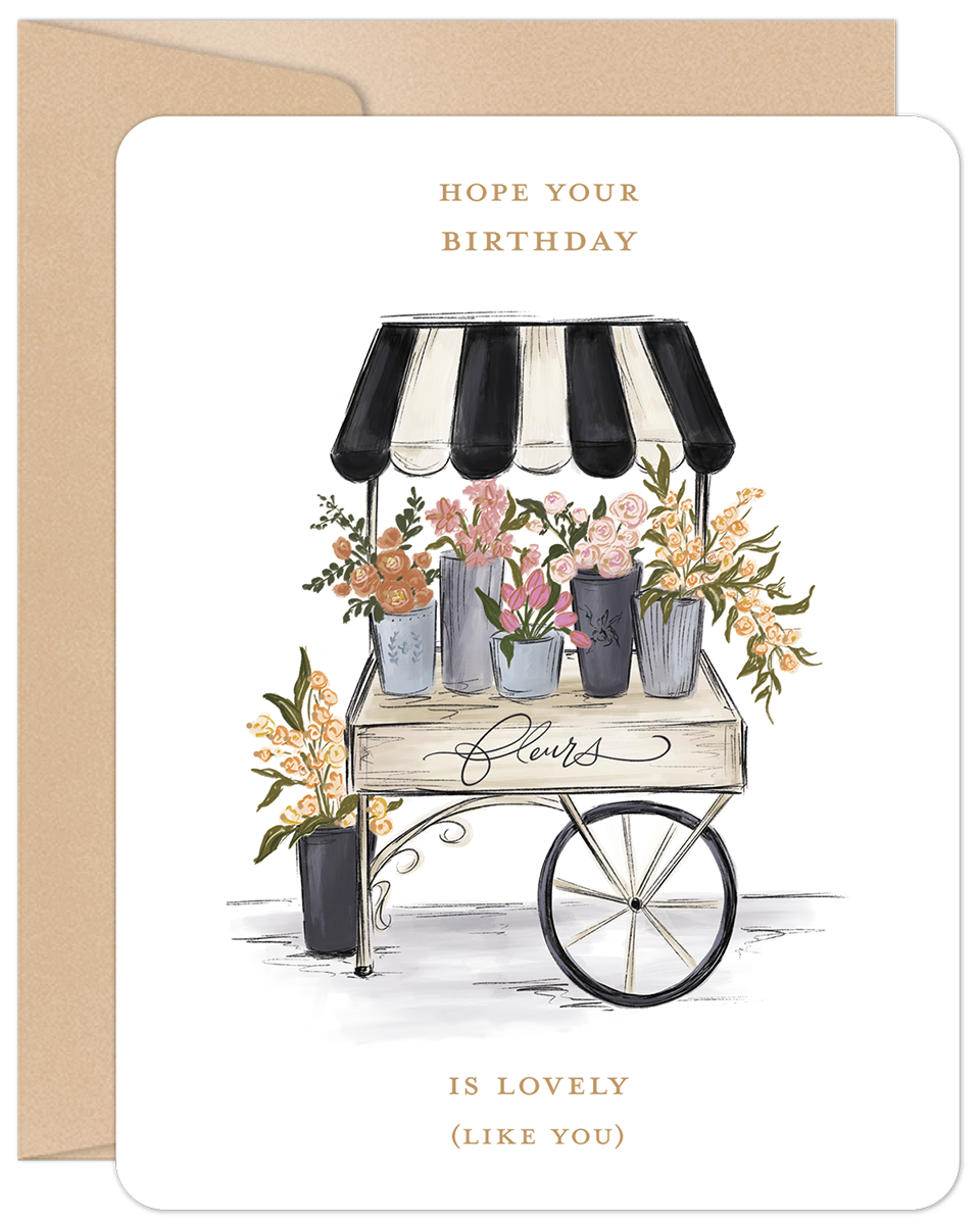 Watercolor illustration greeting card featuring a charming flower cart with vibrant pink, orange, and yellow blooms under a black and white striped awning. Elegant text reads 'HOPE YOUR BIRTHDAY IS LOVELY (LIKE YOU)'. Perfect floral card for a special celebration.