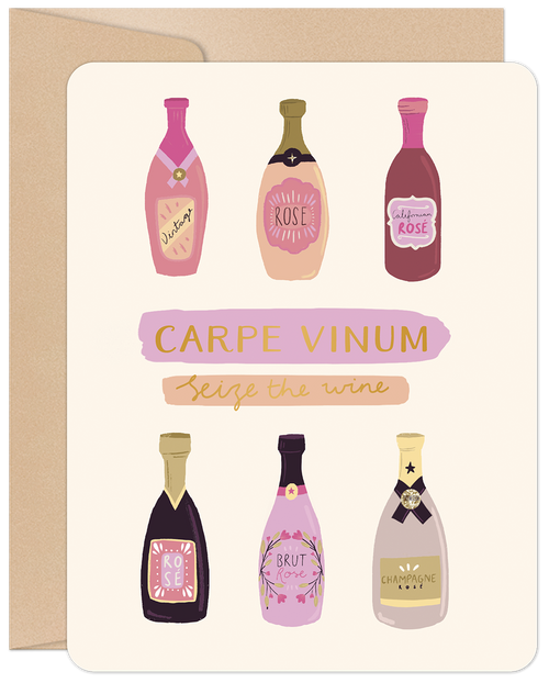 Front of a modern greeting card featuring six colorful, artistic illustrations of champagne and rosé wine bottles with labels like 'Vintage', 'Rose', 'California Rose', 'Brut Rose', and 'Champagne Rose'. Bold text reads 'CARPE VINUM' (Seize the wine) in pink and gold hues. Perfect for wine lovers.