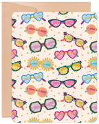 Front view of a cute birthday greeting card featuring a vibrant, repeating pattern of various colorful sunglasses on a light pink background with gold polka dots, perfect for Her.