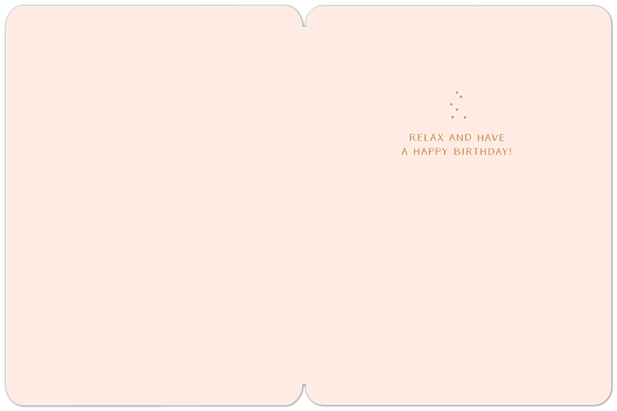 Inside view of a light pink greeting card with minimal design. Gold text on the right side reads 'RELAX AND HAVE A HAPPY BIRTHDAY!'