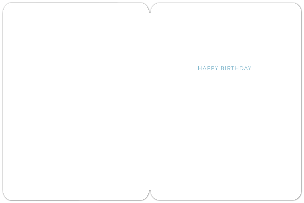Interior view of a blank white birthday greeting card, revealing a simple 'HAPPY BIRTHDAY' message in light blue font on the right side.