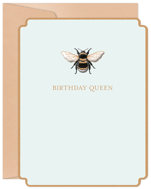 Elegant birthday card for her featuring a detailed bumblebee illustration and gold foil text 'BIRTHDAY QUEEN' on a light blue background, paired with a natural kraft envelope.