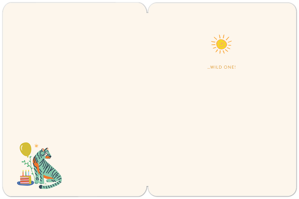 Inside of a cute wild one birthday card, showing a tiger illustration, a birthday cake, balloons, and the text '...WILD ONE!' on a cream background with a small sun icon.