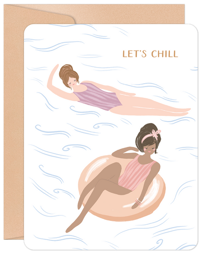 Front of a 'Let's Chill' greeting card showing two women relaxing in a pool, one on a floatie, with a kraft paper envelope.