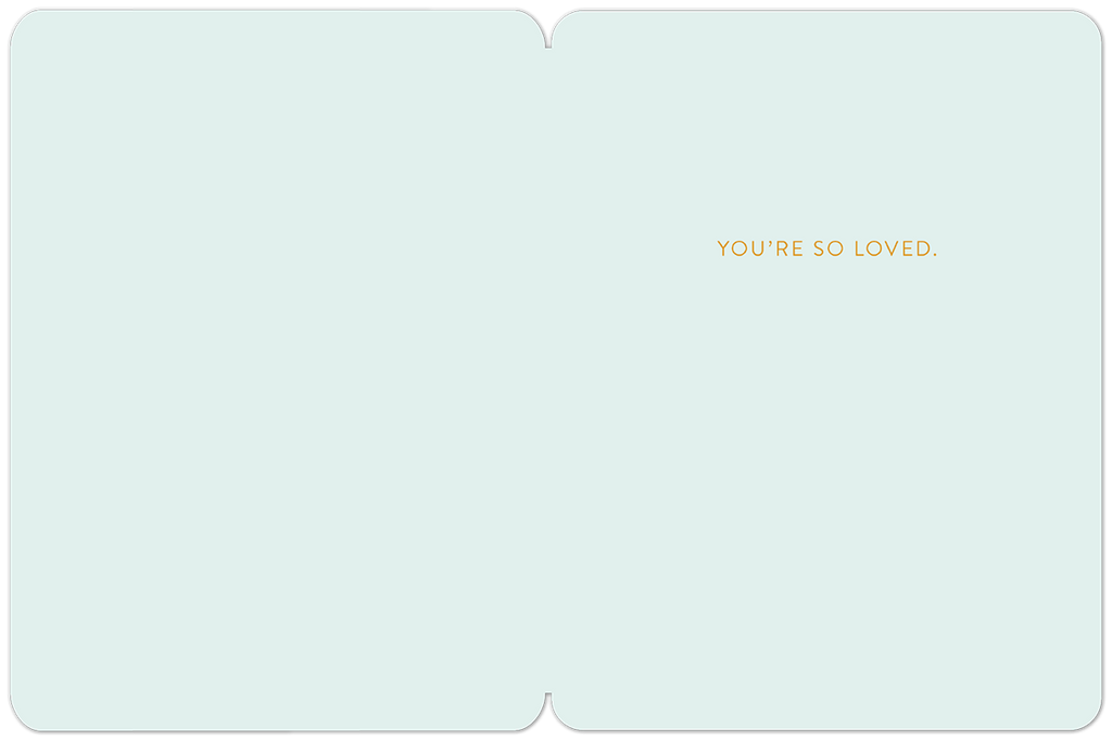Inside of a heartfelt new baby card with the message 'YOU'RE SO LOVED.' in elegant gold lettering on a soft blue background.
