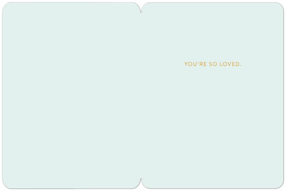 Inside of a heartfelt new baby card with the message 'YOU'RE SO LOVED.' in elegant gold lettering on a soft blue background.