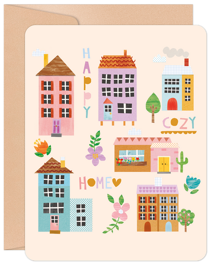 Front of a Happy Cozy Home new home greeting card featuring an illustration of various colorful drawn houses and floral accents.