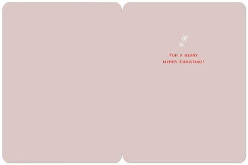 Inside of a holiday greeting card with a simple message 'FOR A BEARY MERRY CHRISTMAS!' and two small snowflakes, on a light pink background.