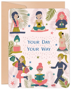 Front of a vibrant women's self-care greeting card, featuring diverse women enjoying activities like yoga, reading, shopping, spa treatment, and exercise amidst tropical leaves. Text: 'YOUR DAY YOUR WAY'.