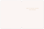 Inside of a cream-colored greeting card displaying the elegant gold text: "HERE'S TO THE NEXT CHAPTER! HAPPY BIRTHDAY" in the center.
