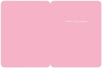Inside of a simple pink Halloween greeting card with "HAPPY HALLOWEEN" printed in white text on the right side.