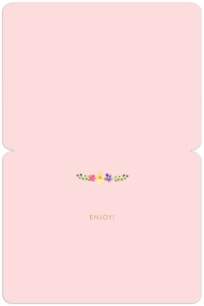 Inside of 'Happy Spring' greeting card, light pink with a small floral wreath and 'Enjoy!' text at the bottom.