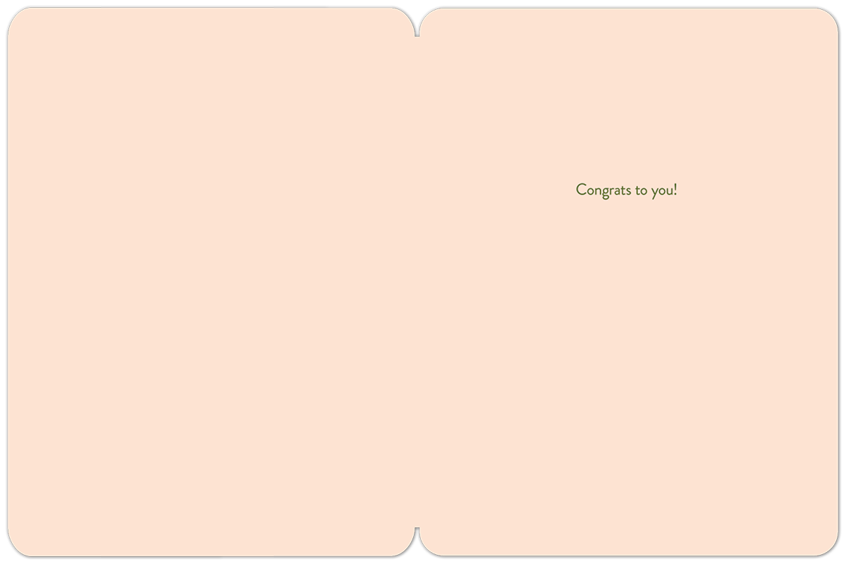 Inside of a graduation greeting card with the message 'Congrats to you!' on a light pink background, ready for a personal note.