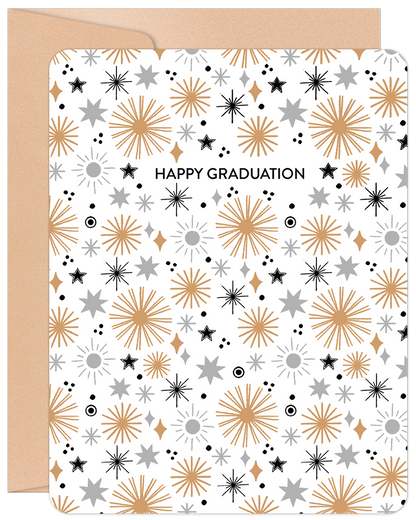 Front of a 'Happy Graduation' greeting card featuring a modern pattern of gold, silver, and black stars on a white background.