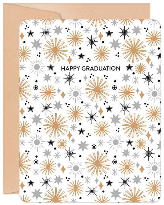 Front of a 'Happy Graduation' greeting card featuring a modern pattern of gold, silver, and black stars on a white background.