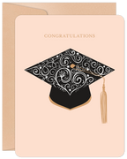 Elegant cream-colored greeting card featuring a black ornate academic cap with a gold tassel, and 'Congratulations' text, ideal for celebrating academic achievement and success.