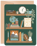 Greeting card for dad featuring three rustic wooden shelves against a dark green background, adorned with a vintage record player, potted plants, a globe, books, a clock, a framed 'HAPPY DAD'S DAY' sign, a football, and a mountain art print, perfect for celebrating a special parent.