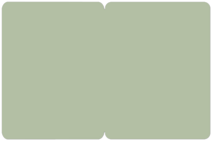 Inside of a greeting card, blank and light grey-green, providing space for a personalized message.