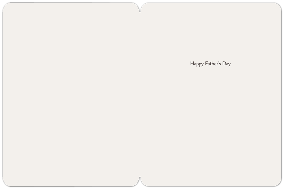 Inside view of a cream-colored Father's Day greeting card, blank on the left with 'Happy Father's Day' printed subtly on the right side, ready for a personal message.