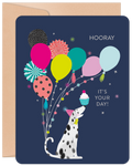 Cute birthday greeting card for anyone featuring a dalmatian dog in a party hat balancing a cupcake, surrounded by vibrant balloons on a dark blue background. Perfect for a special day.