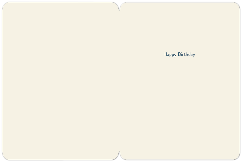 Inside of a lighthearted birthday card showing a cream-colored interior with the simple blue text 'Happy Birthday'.