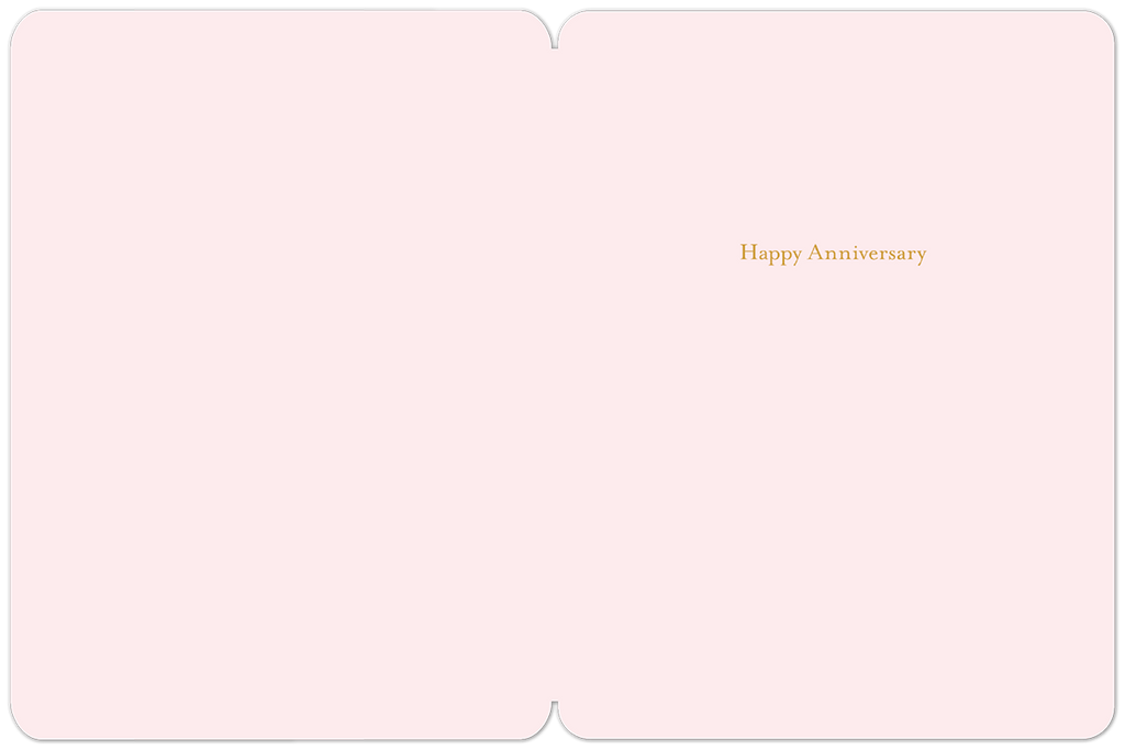 Open anniversary card with a soft pink interior, revealing a subtle gold 'Happy Anniversary' message printed on the right side, ready for a personalized sentiment.