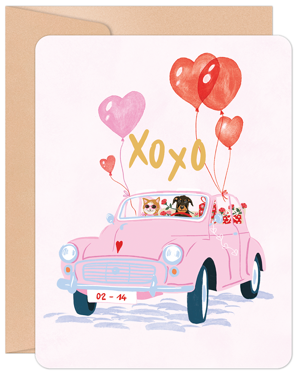 Front of Valentine's Day card showing a pink vintage car with a cat and dog, heart balloons, and XOXO.