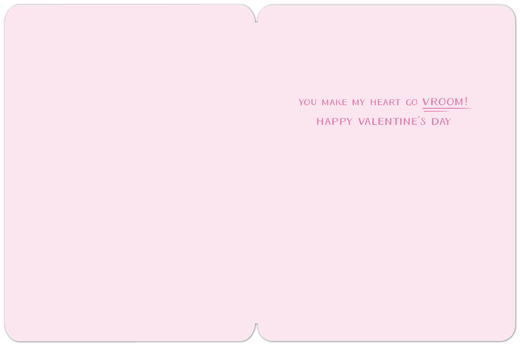 Inside view of the pink Valentine's Day greeting card, showing a simple light pink background with the romantic and punny message in elegant script: 'YOU MAKE MY HEART GO VROOM! HAPPY VALENTINE'S DAY'.