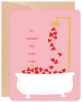 Pink Valentine's Day greeting card showing a golden shower head pouring red hearts into a white bathtub, with the text 'I'll Shower You With Love' in red.