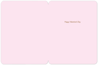 Inside of a pink Valentine's Day card with the text "Happy Valentine's Day" on the right side.
