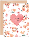 Front view of a romantic watercolor greeting card featuring a large pink heart with 'LOVE YOU' text, surrounded by soft peach and pink floral blossoms. A kraft paper envelope is visible behind the card.