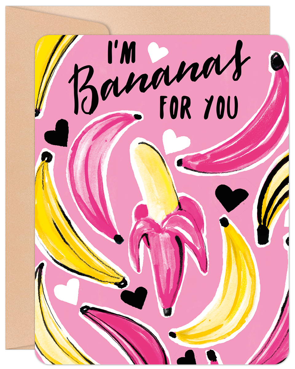 Front of a pink Valentine's Day greeting card with 'I'm Bananas For You' in black script, surrounded by pink and yellow bananas.