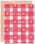 Front view of a Valentine's Day greeting card featuring a charming red and white gingham pattern adorned with golden hearts. The card displays the heartfelt message 'LOVE YOU. MEAN IT.' in white text, perfect for expressing affection.
