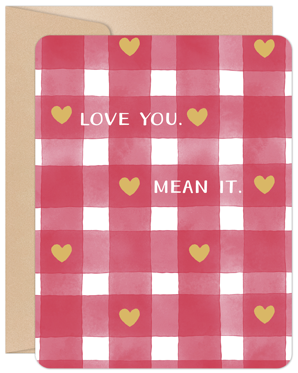 Front of a Valentine's Day card featuring a red and white watercolor gingham pattern, golden hearts, and the message "LOVE YOU. MEAN IT." in white text, all on a kraft paper envelope.